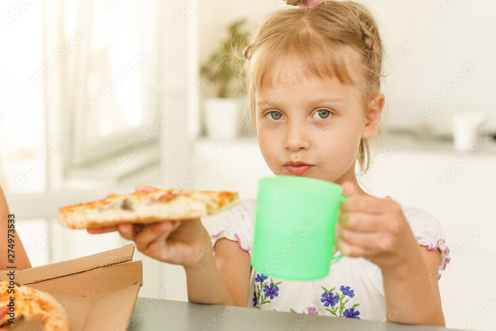 holding pizza - having fun eating dinner - Rebel concept - Focus on left slice holding pizza - having fun eating dinner - Rebel concept - Focus on left slice