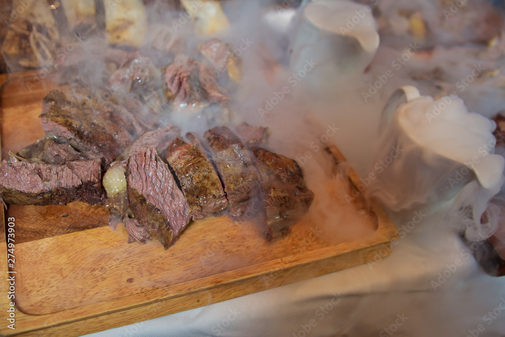 Roasted meat over an open fire, cooked in a special way.Barbecue is prepared of lamb or sheep meat and processed by slasher. Many Cooking Traditional Azerbaijan asting lamb barbecues. Roasted meat over an open fire, cooked in a special way.Barbecue is prepared of lamb or sheep meat and processed by slasher. Many Cooking Traditional Azerbaijan asting lamb barbecues.