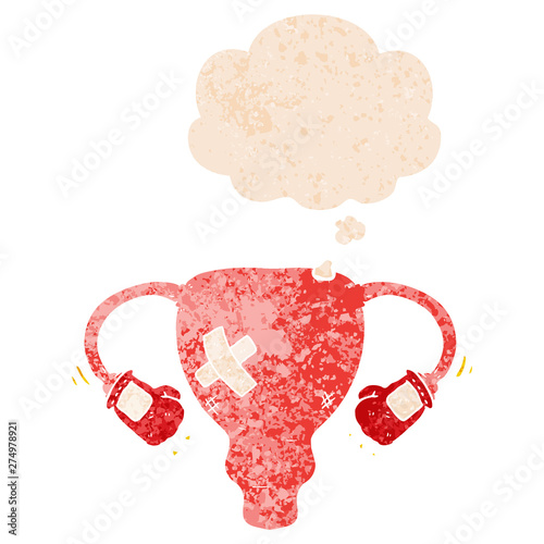 cartoon beat up uterus with boxing gloves and thought bubble in retro textured style