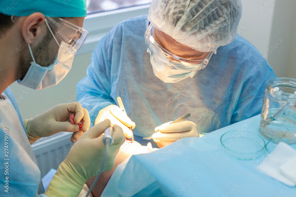 Baldness Treatment Hair Transplant Surgeons In The Operating Room Baldness Treatment Hair Transplant Surgeons In The Operating Room