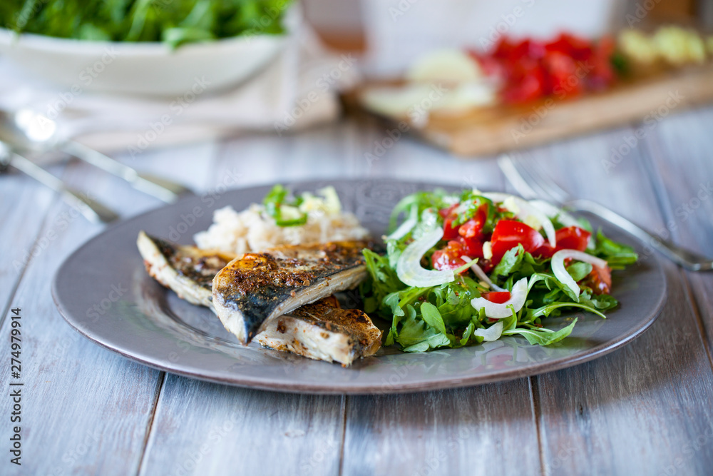 Grilled mackerel with rice and salad Grilled mackerel with rice and salad