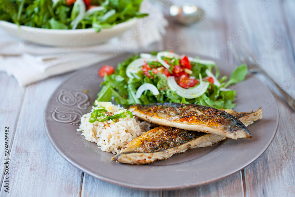 Grilled mackerel with rice and salad