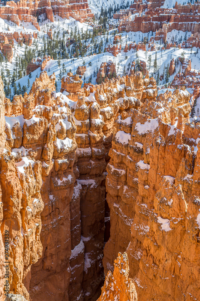 Looking down at snow covered rock formations at Bryce Canyon Looking down at snow covered rock formations at Bryce Canyon