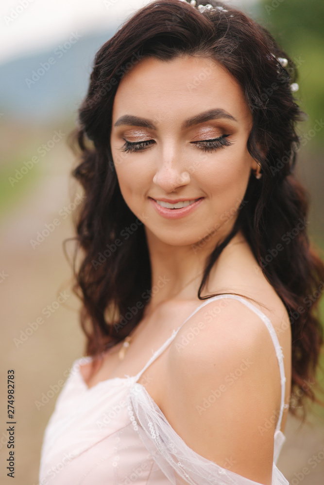 Close up portrait of beautiful bride. Charming woman in wountains Close up portrait of beautiful bride. Charming woman in wountains