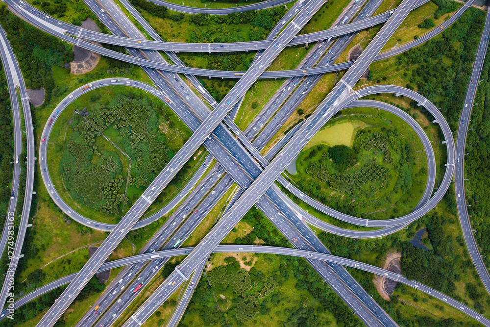 Aerial view of highway junctions. Bridge roads shape number 8 or