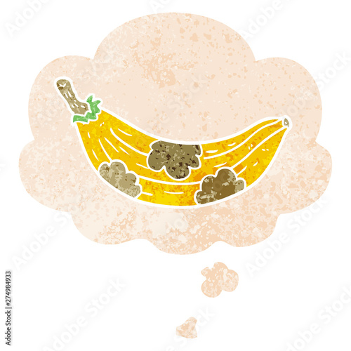 cartoon old banana and thought bubble in retro textured style