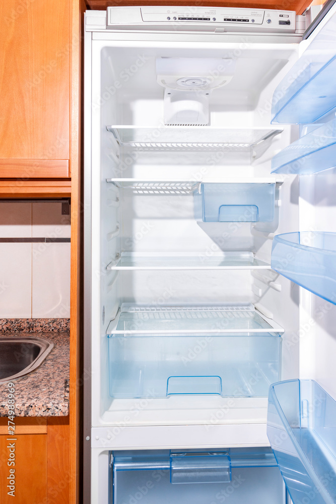 Opened Refrigerator interior Opened Refrigerator interior