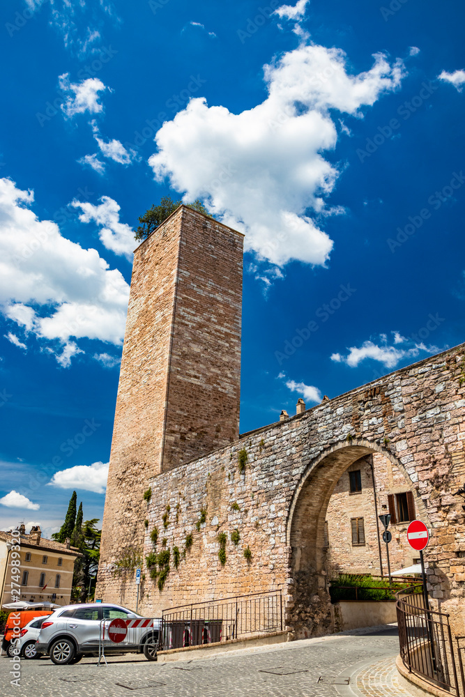 The consular door with the tower. One of the accesses to the city walls. In Spello, province of Perugia, Umbria, Italy.