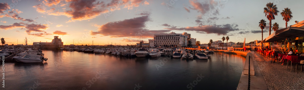 marina of Faro city at sunset