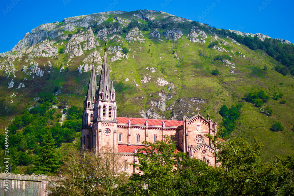 Facade of the Basilica de Santa Maria la Real de Covadonga (or Basilica of Covadonga) in Cangas de Onis, Asturias, Spain. Popular holy icon of the reconquest of Spain by Pelayo