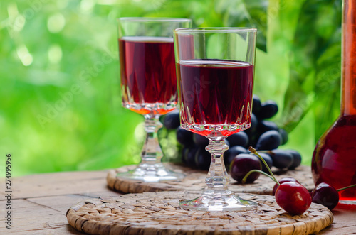 Bilde på lerret Ratafia - tipical Italian sweet alcoholic beverage, either a fruit-based beverage or a fortified wine with cherries