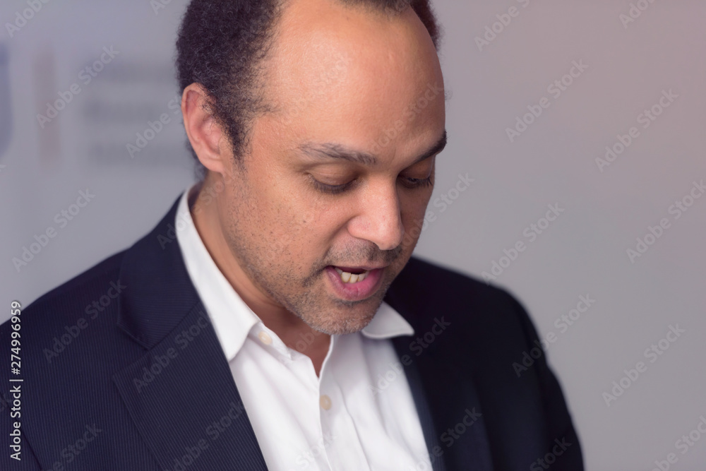 African american business coach gives presentation for business people, multiracial and multiethnic business peoople at conference meeting room. African american business coach gives presentation for business people, multiracial and multiethnic business peoople at conference meeting room.