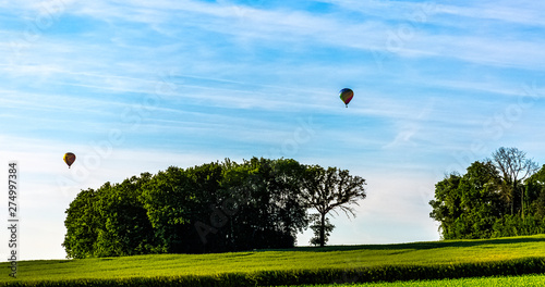 Hot air balloons over French fields - Dinan, France