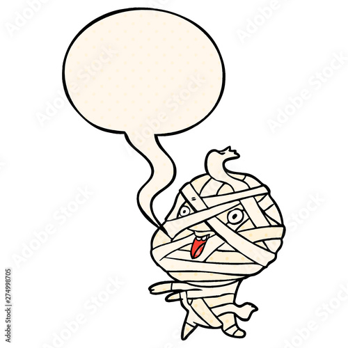 cute cartoon halloween mummy and speech bubble in comic book style