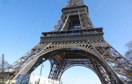 PARIS-FRANCE-FEB 25, 2019: The Eiffel Tower is a wrought-iron lattice tower on the Champ de Mars in Paris, France. It is named after the engineer Gustave Eiffel. © cratervalley