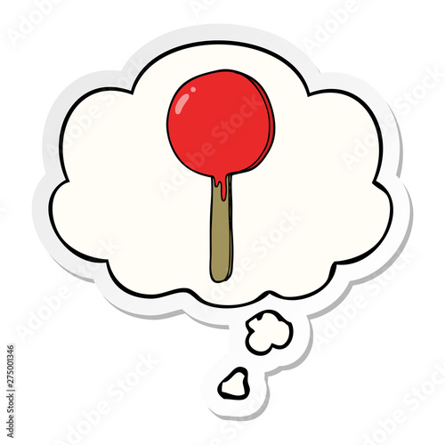 cartoon lollipop and thought bubble as a printed sticker