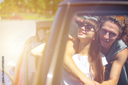 Young friends ready to travel by the car