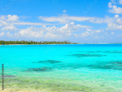 Azure turquoise water in lagoon of the Cocos Keeling atoll. © Daguimagery