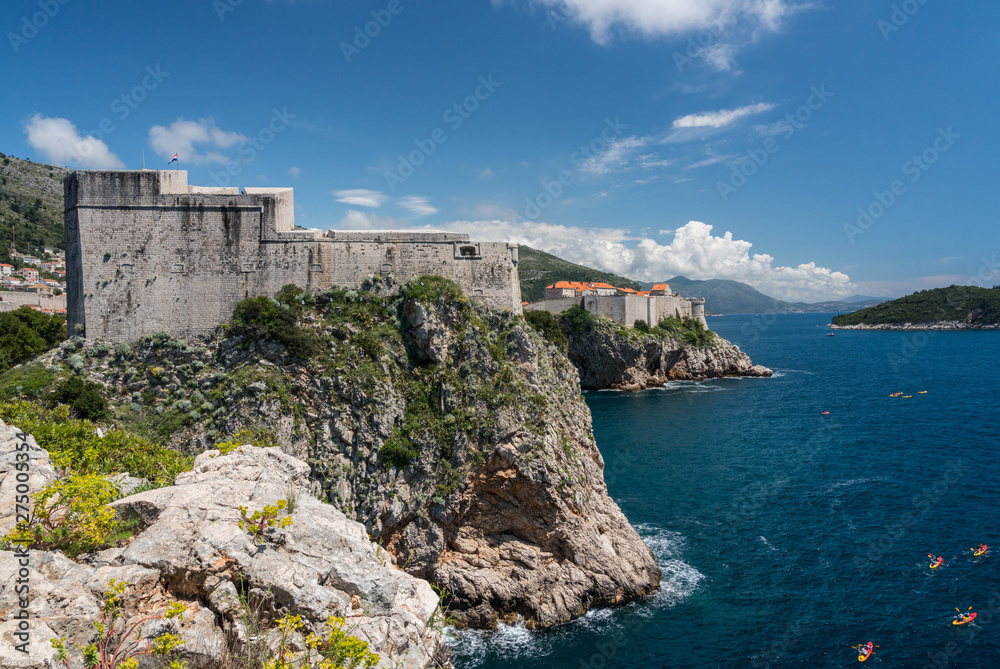 Panorama of the cliffside under Fort Lawrence and city walls of the old town in Dubrovnik