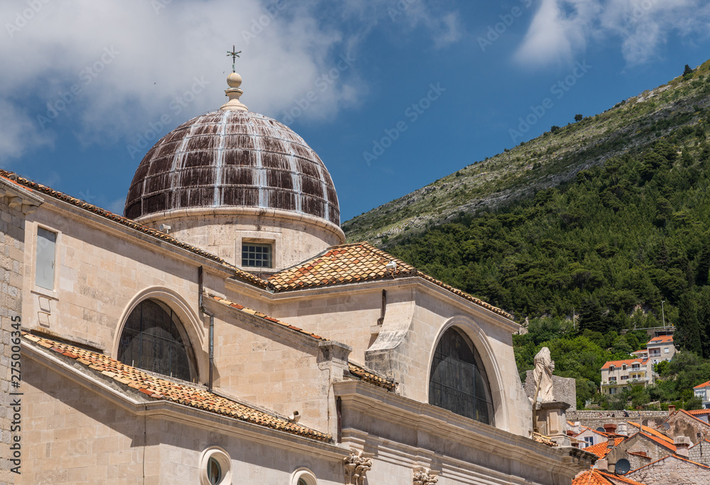 Statues and dome on St Blaise church in the old town of Dubrovnik in Croatia
