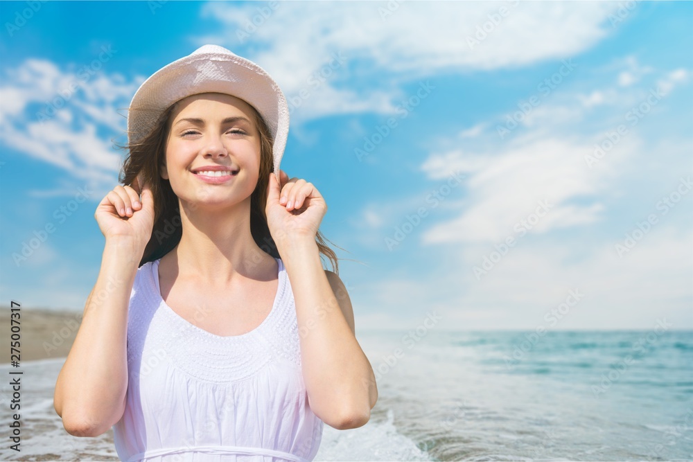 Young relaxed woman on blurred nature background Young relaxed woman on blurred nature background