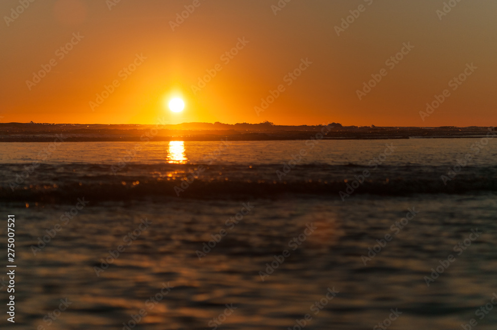 sunset  sun reflection water