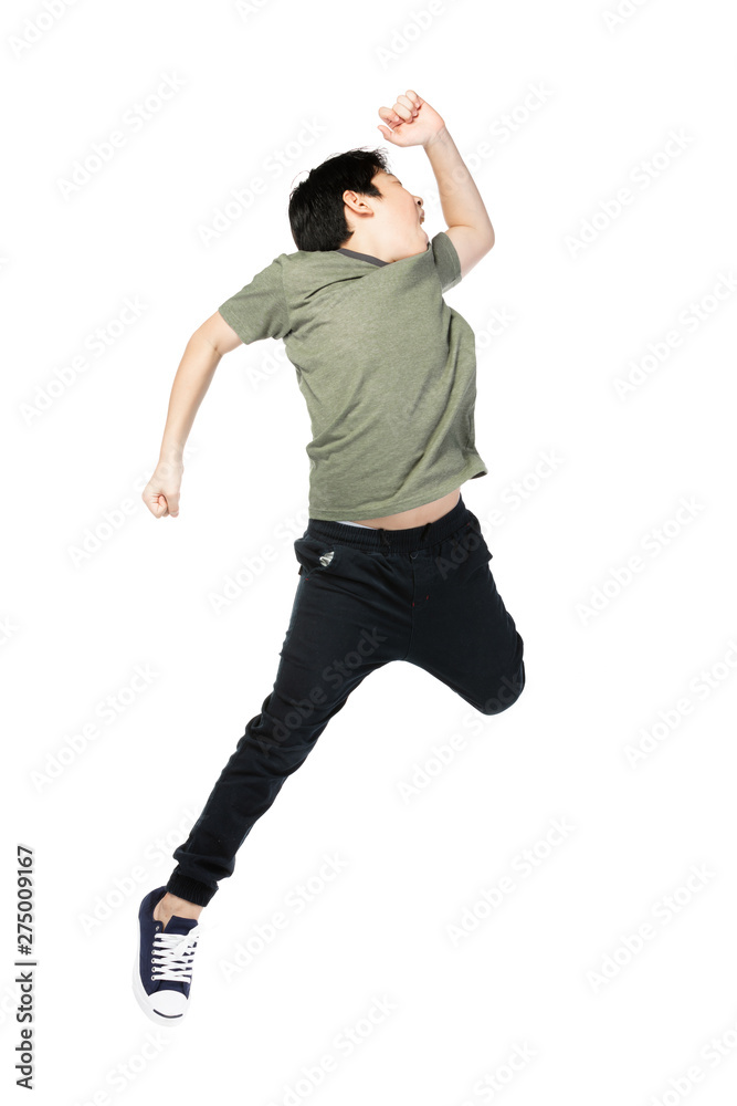 Portrait of happy little Asian child jumping isolated on white Portrait of happy little Asian child jumping isolated on white