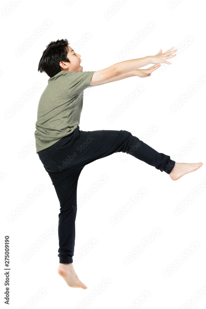 Obraz premium Portrait of happy little Asian child jumping isolated on white