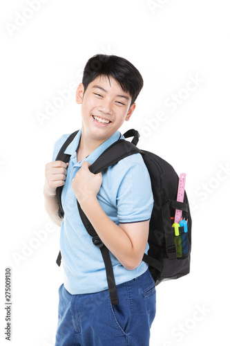 Cute asian child with school stationery on white background .