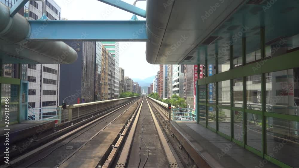 Taipei metro station system. Taipei cityscape, view from the MRT Wenhu line compartment ( 4K UHD time-lapse ) Taipei metro station system. Taipei cityscape, view from the MRT Wenhu line compartment ( 4K UHD time-lapse )