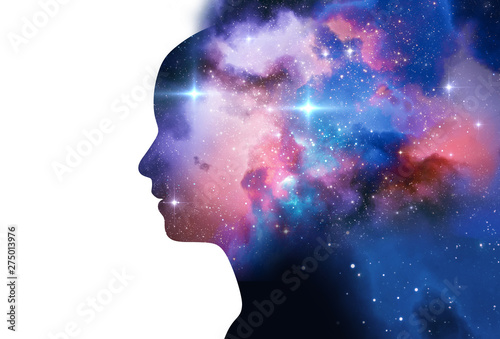 Fotografering silhouette of virtual human with aura chakras on space nebula 3d illustration