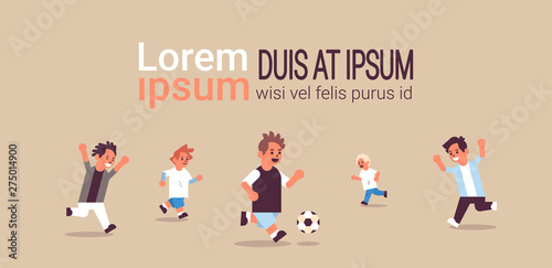 schoolboys playing football elementary school kids having fun with soccer ball sport activities concept male pupils flat full length horizontal copy space