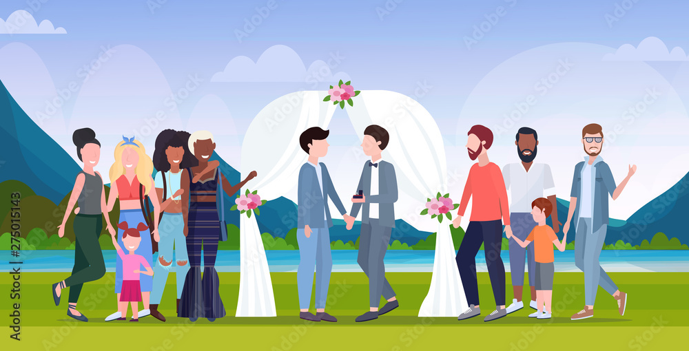 Fototapeta premium couple newly weds gays standing behind floral arch same gender happy married homosexual family wedding celebrating concept landscape background full length flat horizontal
