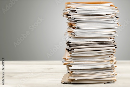 Stack of papers isolated on white background photo