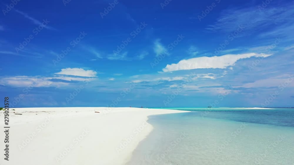 drone View Of Coral Reef With crystal clear ocean water splashing gently on exotic empty beach with white sand, drone shot drone View Of Coral Reef With crystal clear ocean water splashing gently on exotic empty beach with white sand, drone shot