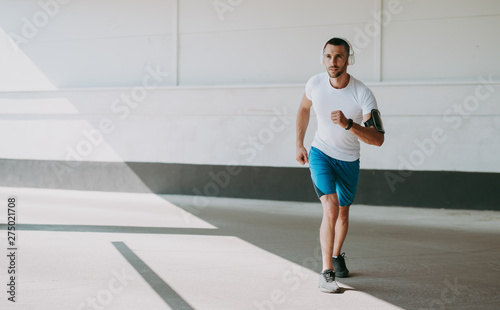 Young man is preparing to run