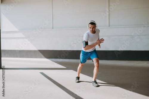 Young man is preparing to run