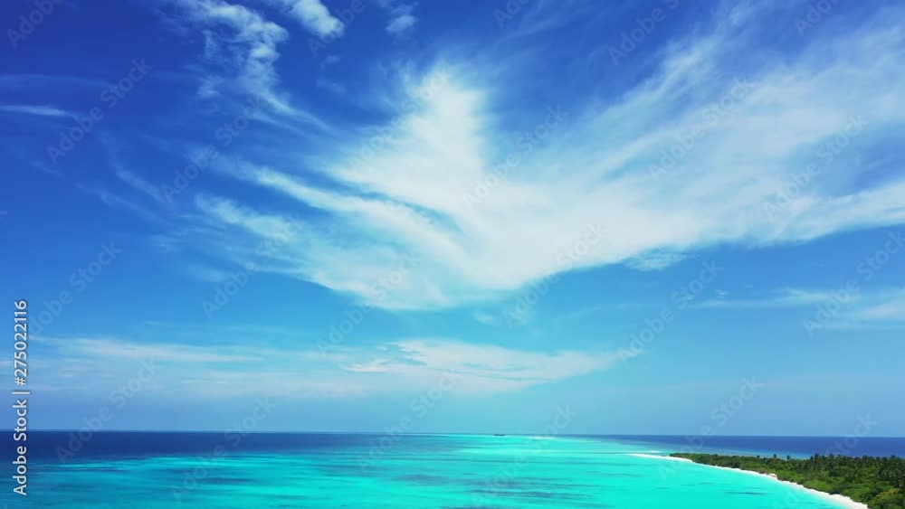aerial drone shot of crystal clear emerald see and Uncontaminated coastline of tropical Caribbean Coral Reef Atoll aerial drone shot of crystal clear emerald see and Uncontaminated coastline of tropical Caribbean Coral Reef Atoll