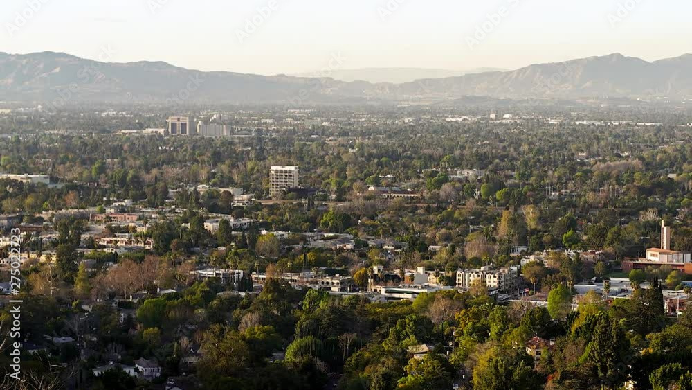 Timelapse looking over urban valley. Timelapse looking over urban valley.