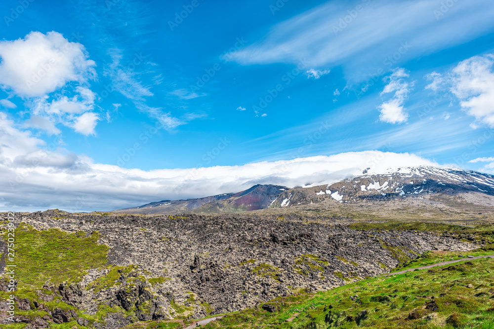 Fototapeta premium Snaefellsjokull, Iceland national park with rocky landscape by Djupalonssandur Beach Hellnar Arnarstapi