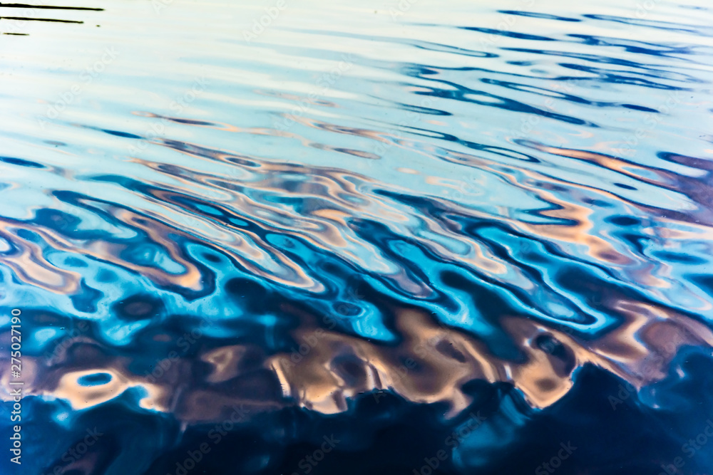 Fototapeta reflection in water ripples
