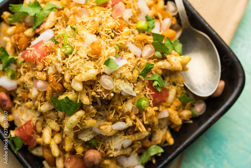 Bhelpuri Chaat/chay is a road side tasty food from India, served in a bowl or plate. selective focus