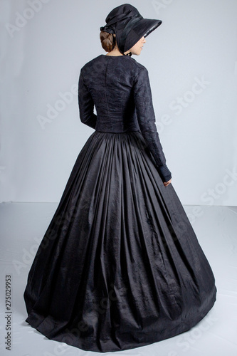 Wallpaper Mural Victorian woman in black outfit Torontodigital.ca