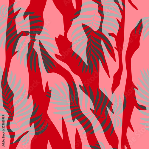 abstract seamless pattern of palm leaves on a red background
