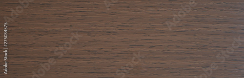 Natural dark wood, horizontally disposed, saw cut. Background. Texture. Close-up. photo