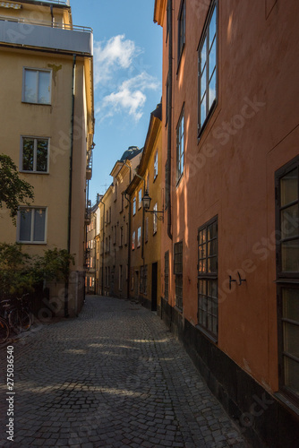 Fototapeta Naklejka Na Ścianę i Meble -  Streets and alleys in the old town, Gamla Stan, in Stockholm an early summer morning