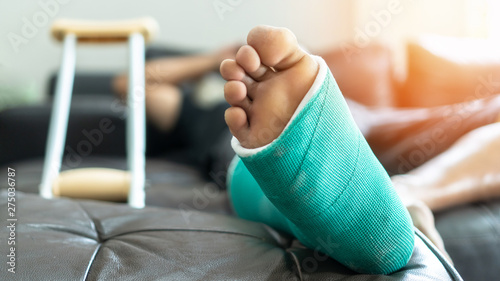 Valokuva Bone fracture foot and leg of male patient with splint cast during surgery rehab