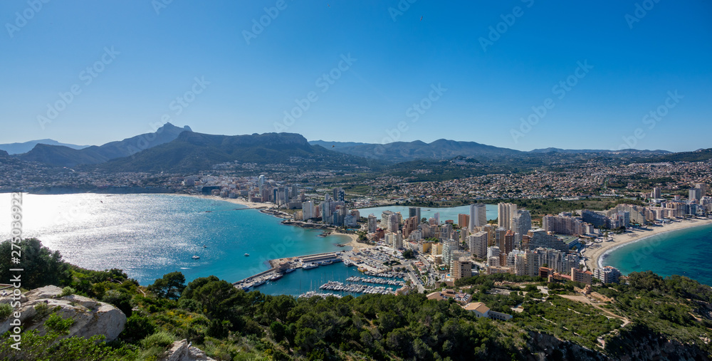 Fototapeta premium Beaches and mountains of Calpe. View from the natural park of Penyal d'Ifac, Spain
