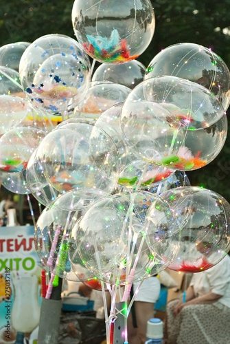 August 16, 2019. Chernivtsi, Ukraine. Youth, musical ethno festival "Obnovafest". Many people are standing by the scene at the music festival. Balloons with garlands on the background of the scene.