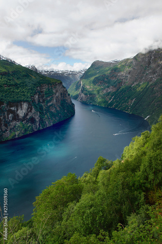 Travel to Norway, view of the blue fjord in the midst of green mountains